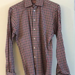 Men’s red and plaid Thomas Pink shirt.